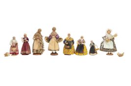 A COLLECTION OF EIGHT FRENCH TERRACOTTA SANTON FIGURES