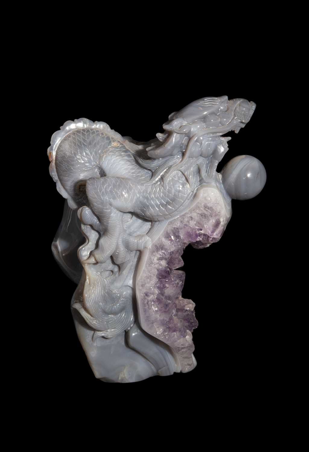 AN AGATE AND AMETHYST GEODE CARVED AS A DRAGON