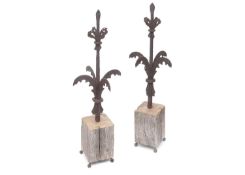 A LARGE PAIR OF EARLY WROUGHT IRON FINIALS LATER MOUNTED