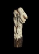 A CARVED ANTLER CANE HANDLE DECORATED WITH BEARS AND SALMON