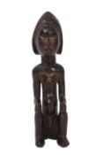 TRIBAL ART / ETHNOGRAPHIC ART: A CARVED HARDWOOD FIGURE