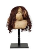 A CAST BUST OF AN ORANGUTAN WITH HAIR BY SIMON 'THE STUFFA' WILSON