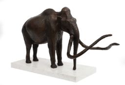 A BRONZE MODEL OF A FULL WOOLLY MAMMOTH