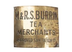 A 19TH CENTURY BRASS ADVERTISING SIGN