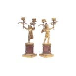 A PAIR OF 19TH CENTURY FRENCH GILT BRONZE AND MARBLE CHERUB CANDELABRA