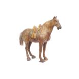 A TANG DYNASTY STYLE GLAZED POTTERY HORSE