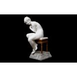 A LATE 19TH CENTURY ITALIAN ALABASTER FIGURE OF A NUDE GIRL ON A STOOL