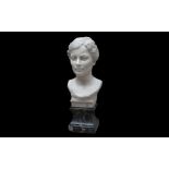 AN EARLY 20TH CENTURY LIFE-SIZE MARBLE BUST OF A LADY