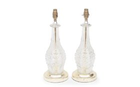 A PAIR OF FRENCH MOULDED GLASS AND PARCEL GILT LAMP BASES