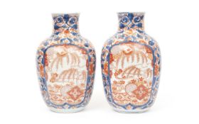 A PAIR OF 19TH CENTURY JAPANESE IMARI PORCELAIN VASES