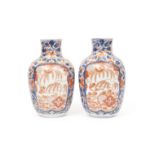 A PAIR OF 19TH CENTURY JAPANESE IMARI PORCELAIN VASES