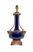 A LOUIS XVI STYLE PORCELAIN LAMP BASE