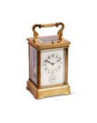 AN EARLY 20TH CENTURY FRENCH LACQUERED BRASS CARRIAGE CLOCK WITH ALARM AND REPEAT