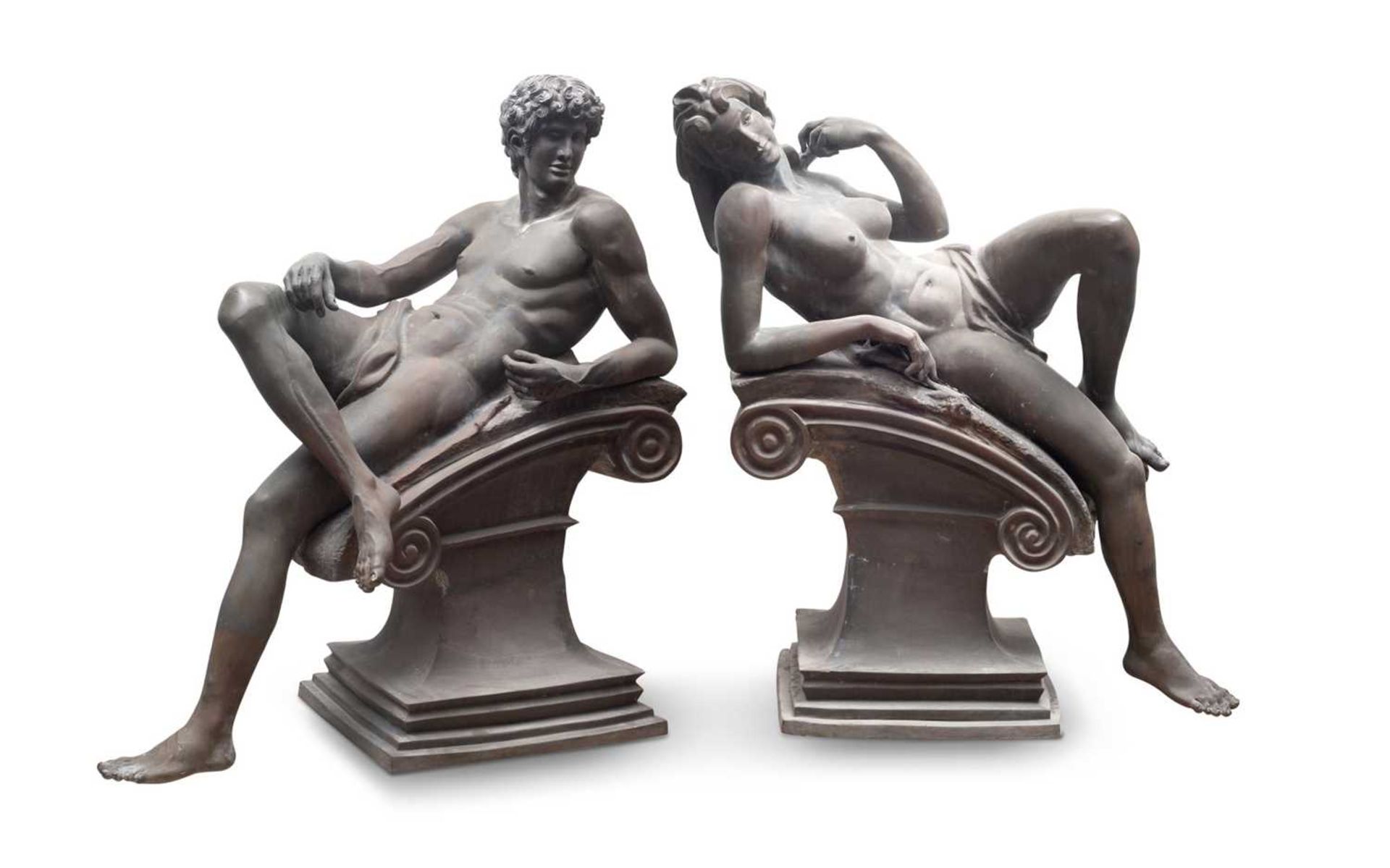 A PAIR OF MONUMENTAL BRONZE FIGURES OF DAY AND NIGHT AFTER MICHELANGELO