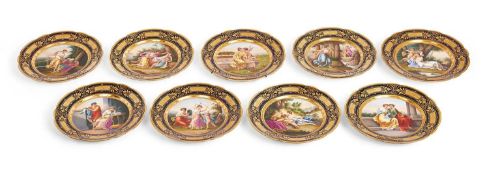 A FINE SET OF NINE ROYAL VIENNA PORCELAIN AND GILT CABINET PLATES