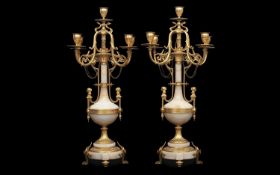 A FINE PAIR OF LATE 19TH CENTURY FRENCH GILT BRONZE AND ALGERIAN ONYX CANDELABRA