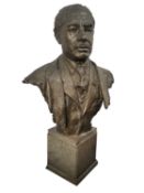 A 20TH CENTURY DANISH LIFE-SIZE BRONZE BUST OF A GENTLEMAN WITH MEDAL