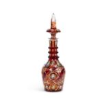 AN EARLY 20TH CENTURY BOHEMIAN CUT, FLASHED AND ENAMELLED GLASS DECANTER FOR THE PERSIAN MARKET