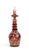 AN EARLY 20TH CENTURY BOHEMIAN CUT, FLASHED AND ENAMELLED GLASS DECANTER FOR THE PERSIAN MARKET