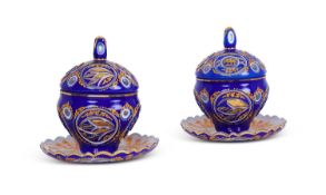 A PAIR OF BOHEMIAN OVERLAY AND PARCEL GILT GLASS BOWLS AND COVERS FOR THE PERSIAN MARKET