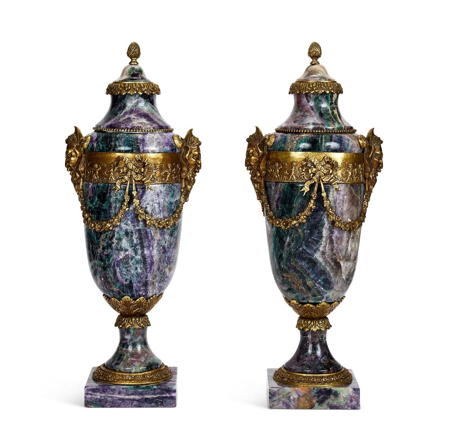 A PAIR OF LOUIS XVI STYLE AMETHYST QUARTZ AND ORMOLU MOUNTED URNS