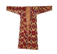 AN EARLY 20TH CENTURY UZBEK IKAT COAT