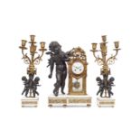 AN EARLY 20TH CENTURY FRENCH FIGURAL CLOCK GARNITURE