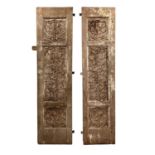 A PAIR OF 19TH CENTURY INDIAN CARVED WOOD DOORS