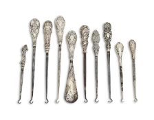 A COLLECTION OF LATE 19TH CENTURY SILVER HANDLED BUTTON HOOKS