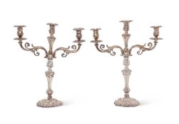 A PAIR OF EARLY 19TH CENTURY OLD SHEFFIELD PLATE CANDELABRA AFTER THE DESIGN BY PAUL STORR