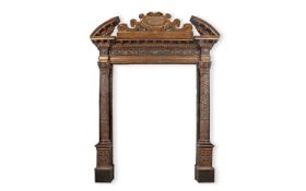 A RARE 17TH CENTURY PAINTED WOOD AND PARCEL GILT BAROQUE DOOR SURROUND
