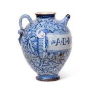 A 17TH CENTURY ITALIAN MAIOLICA BERRETINO WET DRUG JAR