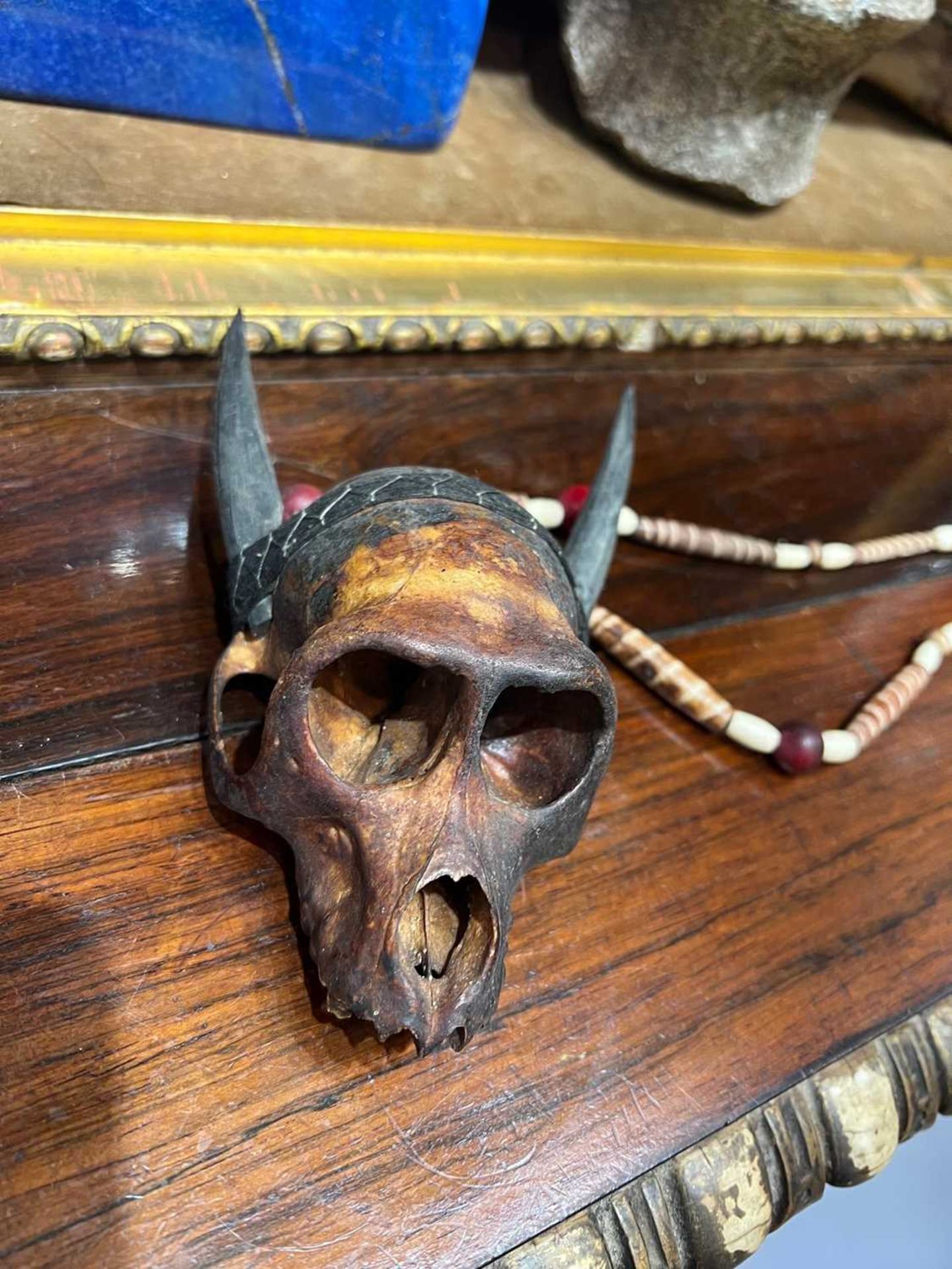 TRIBAL INTEREST: A BONE NECKLACE WITH MONKEY SKULL - Image 2 of 6