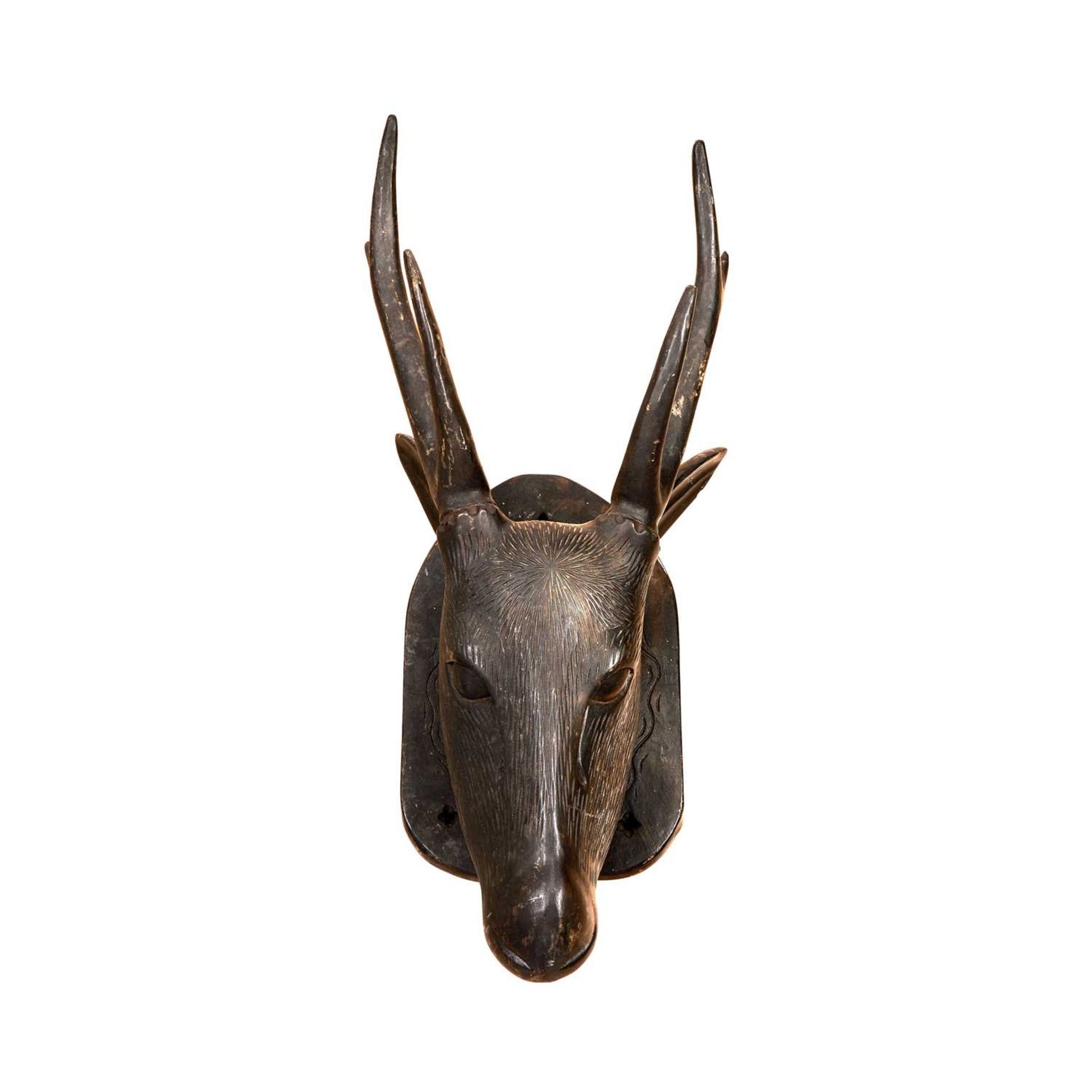 AN ANGLO INDIAN CARVED WOOD DEER HEAD