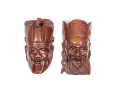 TWO EARLY 20TH CENTURY CHINESE HARDWOOD WALL MASKS