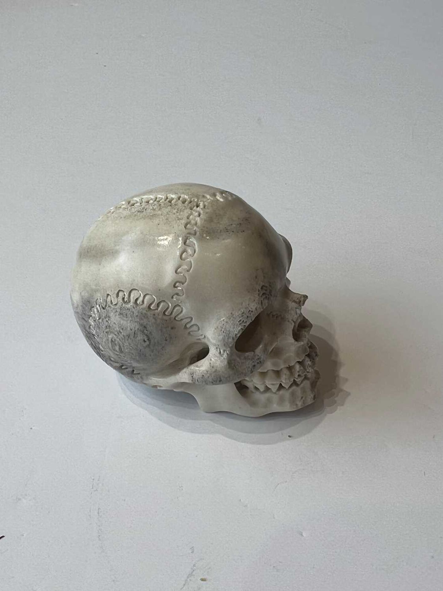 A CARVED MOOSE ANTLER MEMENTO MORI IN THE FORM OF A HUMAN SKULL - Image 2 of 5