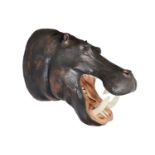 A REPLICA TAXIDERMY HIPPOPOTAMUS HEAD