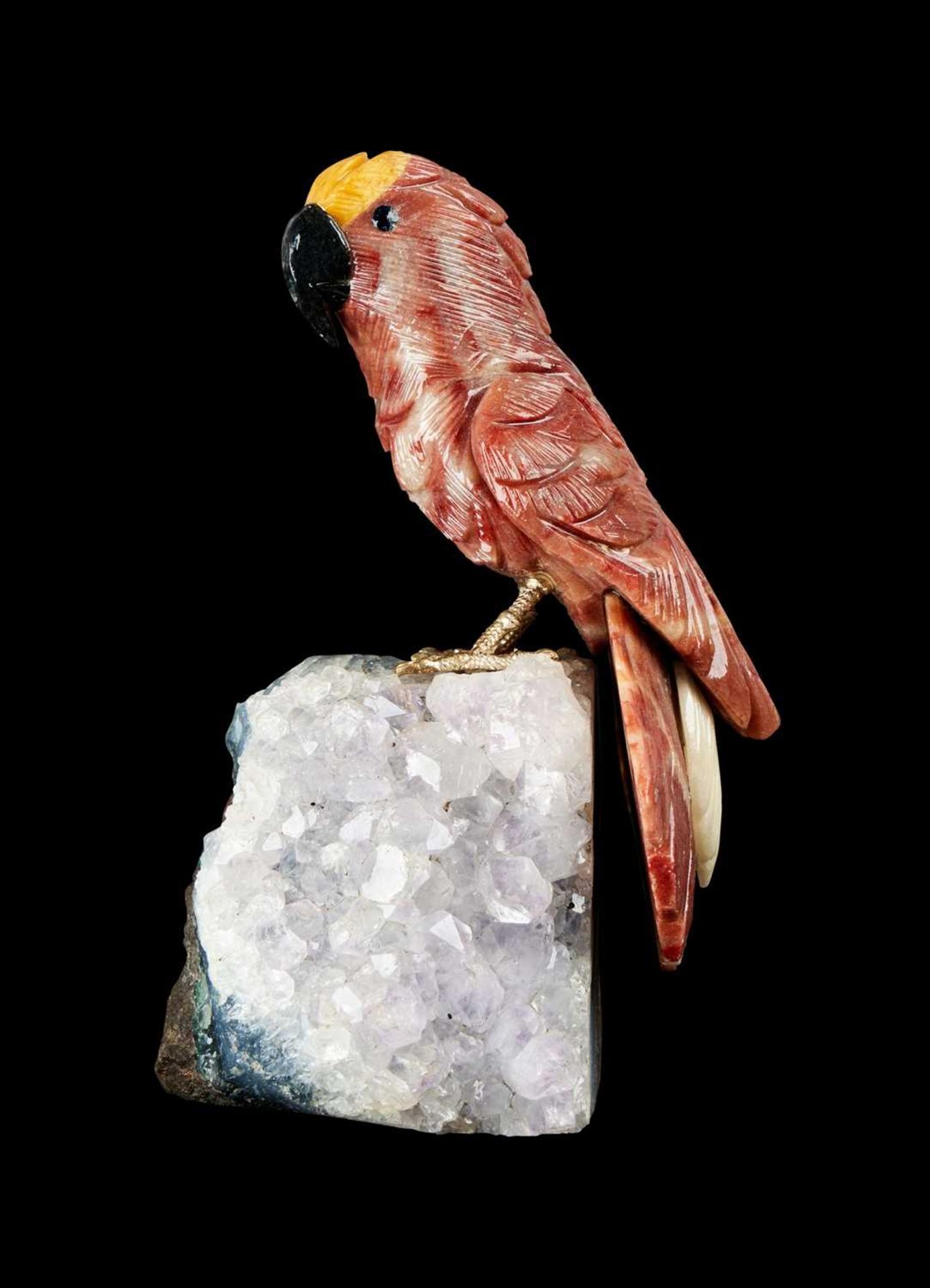 A CARVED HARDSTONE MODEL OF A PARROT