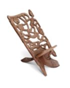 A CARVED AFRICAN PALAVER CHAIR