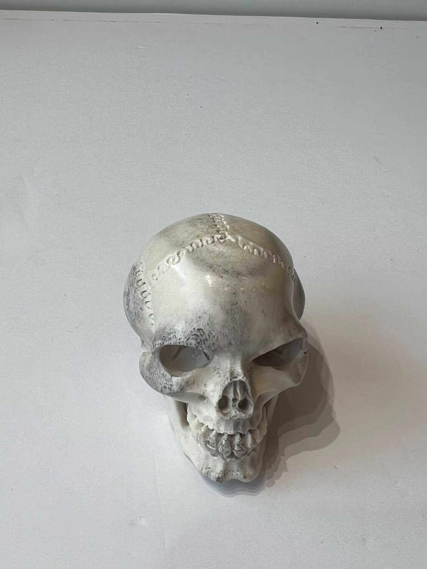 A CARVED MOOSE ANTLER MEMENTO MORI IN THE FORM OF A HUMAN SKULL - Image 3 of 5