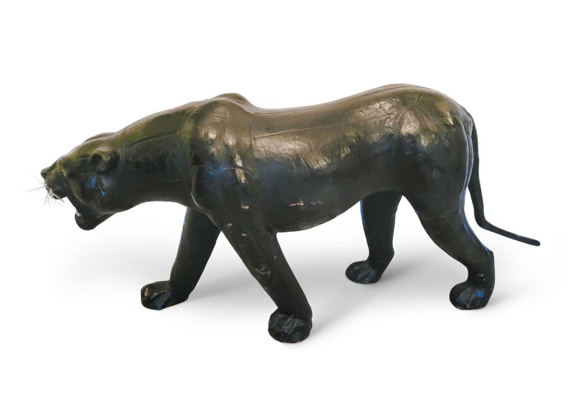 A VERY LARGE LEATHER PANTHER IN THE STYLE OF LIBERTY'S OF LONDON
