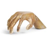 AN OVERSIZED RESIN MODEL OF A HUMAN HAND