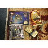 A COLLECTION OF LORD OF THE RINGS RELATED COLLECTABLES TO INCLUDE A BOXED COLLECTORS DVD GIFT SET,