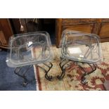 A PAIR OF GLASS TOPPED LAMP TABLES