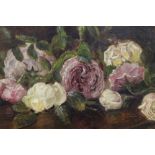 AN ANTIQUE FRAMED OIL ON CANVAS STILL LIFE STUDY OF ROSES INDISTINCTLY SIGNED LOWER RIGHT PICTURE