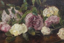 AN ANTIQUE FRAMED OIL ON CANVAS STILL LIFE STUDY OF ROSES INDISTINCTLY SIGNED LOWER RIGHT PICTURE