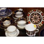 A COLLECTION OF TRIOS AND OTHER CUPS AND SAUCERS TO INCLUDE ROYAL CROWN DERBY 1128 CUP AND SAUCER,