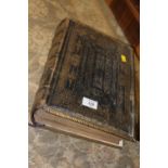A LARGE BRASS BOUND FAMILY BIBLE