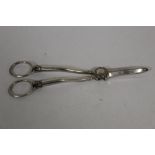 A PAIR OF ANTIQUE WHITE METAL GRAPE SCISSORS