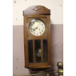 AN EARLY 19TH CENTURY CASED WALLCLOCK WITH PENDULUM H-77 CM